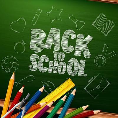 Back to School with school supplies on chalkboard background