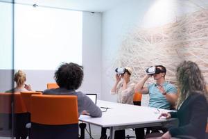 startup business team using virtual reality headset photo