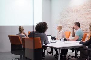 Startup Business Team At A Meeting at modern night office building photo