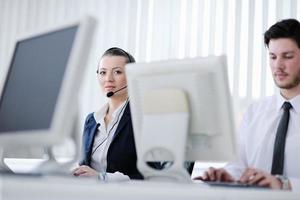 business people group working in customer and help desk office photo