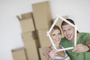 Young couple moving in new home photo