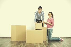 Young couple moving in new home photo