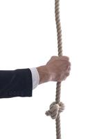 business man with rope isolated on white background photo