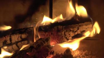Beautiful red and orange hot burning fire in a fireplace video