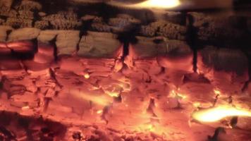 Hyper lapse of a hot fireplace with a piece of wood disintegrating video