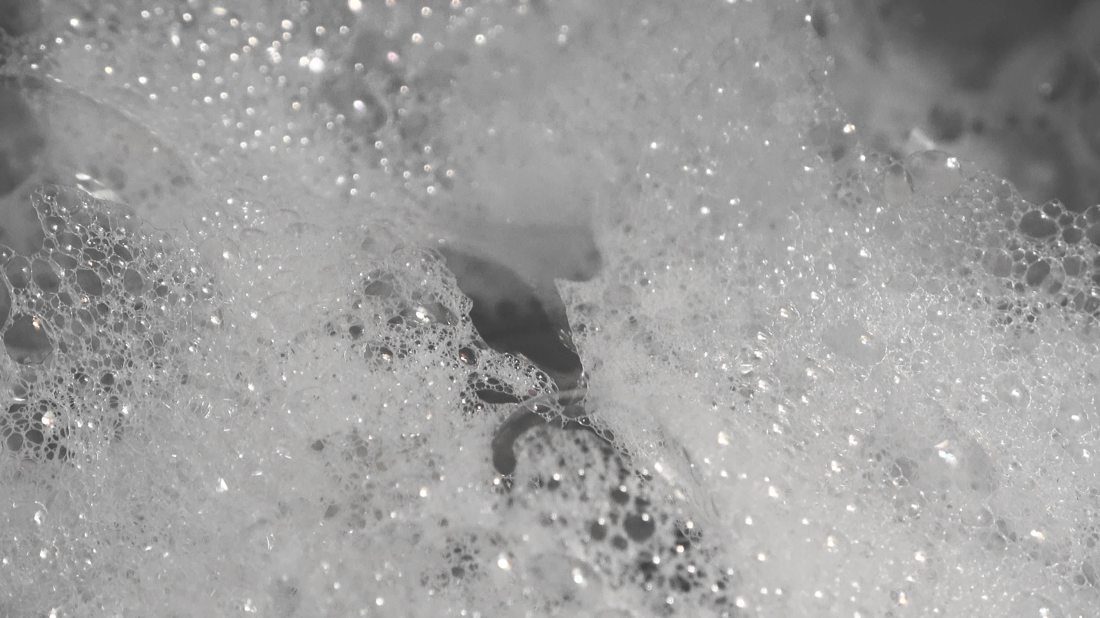 Foam and soap bubbles from water in a sink. 12086008 Stock Video at