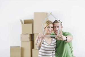 Young couple moving in new home photo