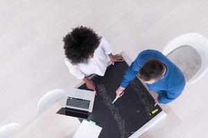 top view of Multiethnic startup business team on meeting photo