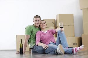 Young couple moving in new home photo