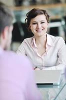 young business woman on meeting photo