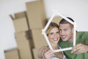 Young couple moving in new home photo