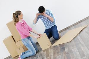 Young couple moving in new home photo