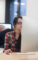 startup business, woman  working on desktop computer photo