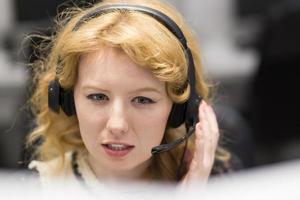 female call centre operator doing her job photo