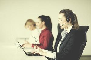 business woman group with headphones photo