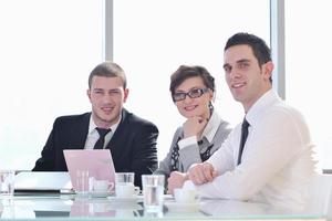 group of business people at meeting photo