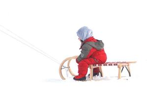 sledding on snow photo