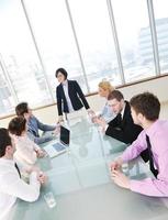 group of business people at meeting photo