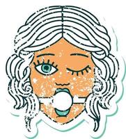 iconic distressed sticker tattoo style image of a winking female face wearing ball gag vector
