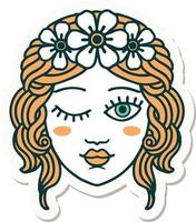 sticker of tattoo in traditional style of a maidens face winking vector