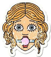distressed sticker tattoo in traditional style of female face wearing a ball gag vector