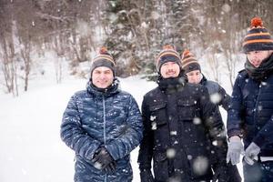 portrait of group young people in beautiful winter landscape photo