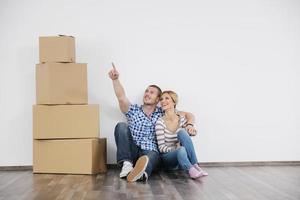 Young couple moving in new home photo