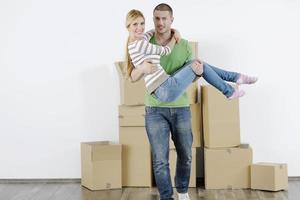 Young couple moving in new home photo
