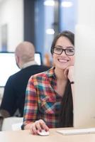 startup business, woman  working on desktop computer photo