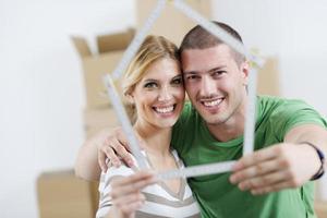 Young couple moving in new house photo