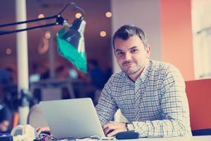 startup business, software developer working on computer photo