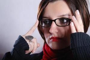 Portrait of a young wonam wearing red scarf photo