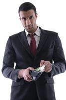 Business man holding money photo