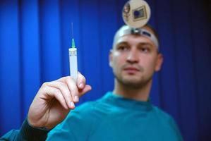 doctor with injection photo