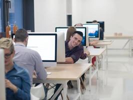 startup business, software developer working on desktop computer photo