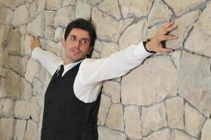 Indoor portrait of young and happy  businessman photo