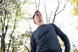 happy young casual man outdoor portrait posing photo