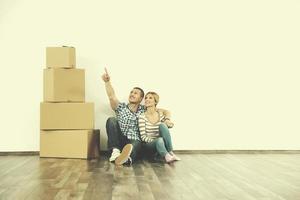 Young couple moving in new house photo