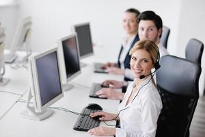 business people group working in customer and help desk office photo