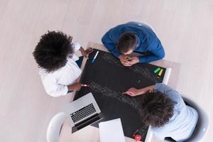 top view of Multiethnic startup business team on meeting photo