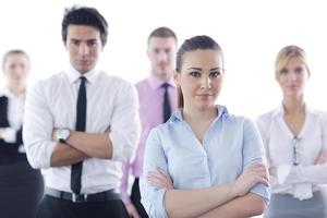 business woman standing with her staff in background photo