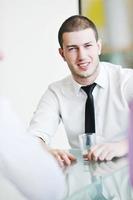 young business man alone in conference room photo
