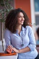 young  business woman at office photo