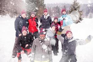 portrait of group young people in beautiful winter landscape photo