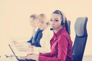 business woman group with headphones photo