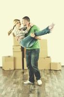 Young couple moving in new house photo