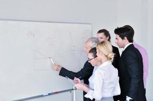 Senior business man giving a presentation photo