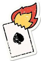 distressed sticker tattoo in traditional style of a flaming card vector