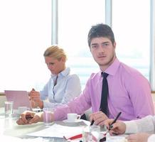 group of business people at meeting photo