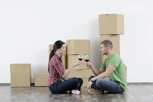 Young couple moving in new home photo